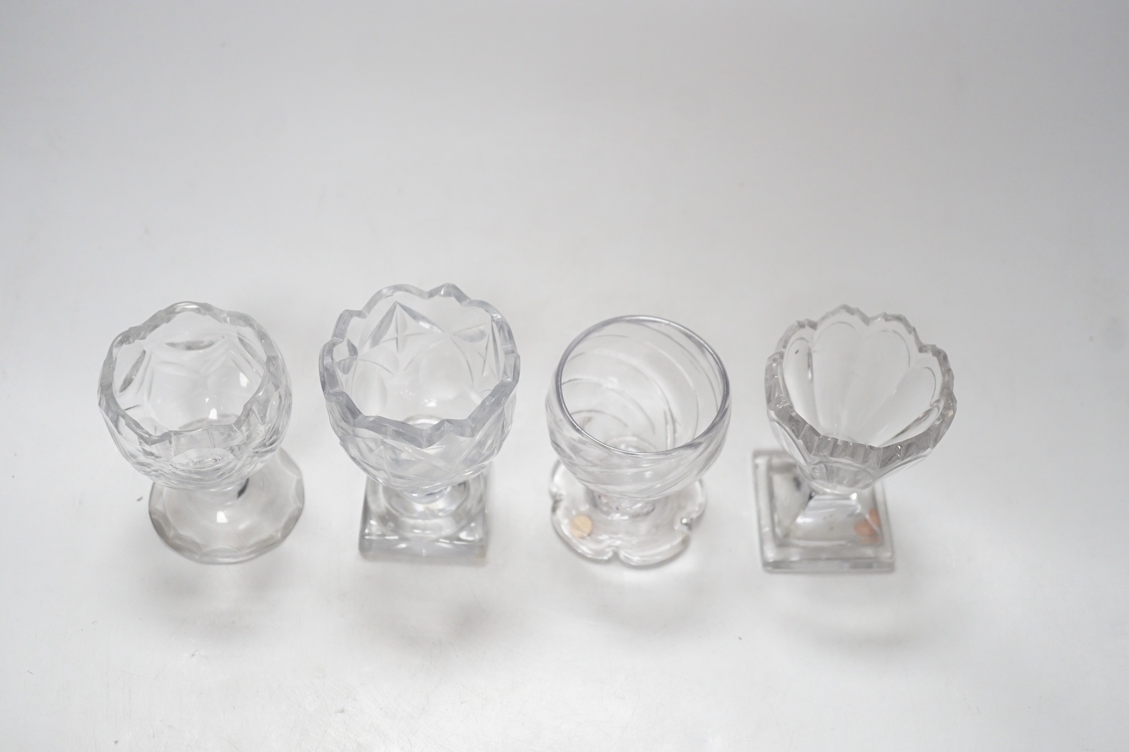 Four 18th century Georgian glass salt cellars, tallest 9cm